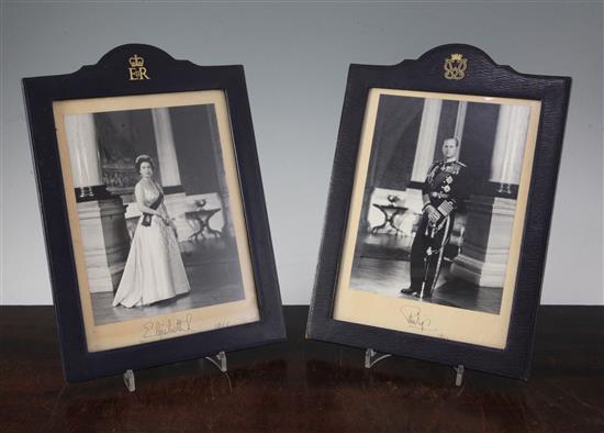 Royal Interest: Two leather framed signed photographs of Queen Elizabeth II and Prince Philip, dated 1966 frames 12.5in. high